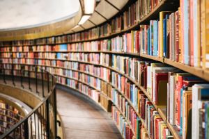 Image of a library's curving wall of books