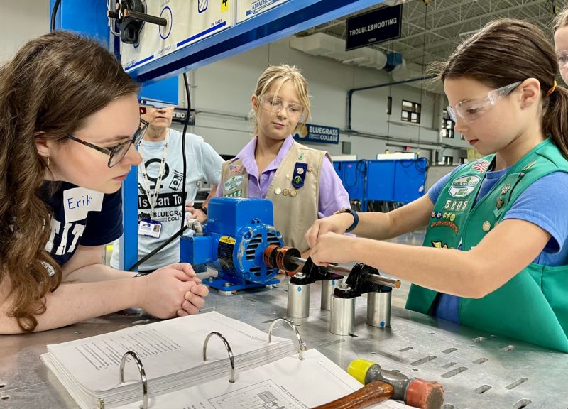 young girls work on hands-on activity
