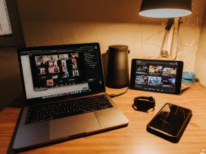 An image of a computer with a Zoom meeting on the screen