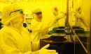 Technicians in a clean room at the U.S. National Science Foundation’s Northeast Advanced Technological Education Center 