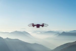 A drone flying in the misty sky